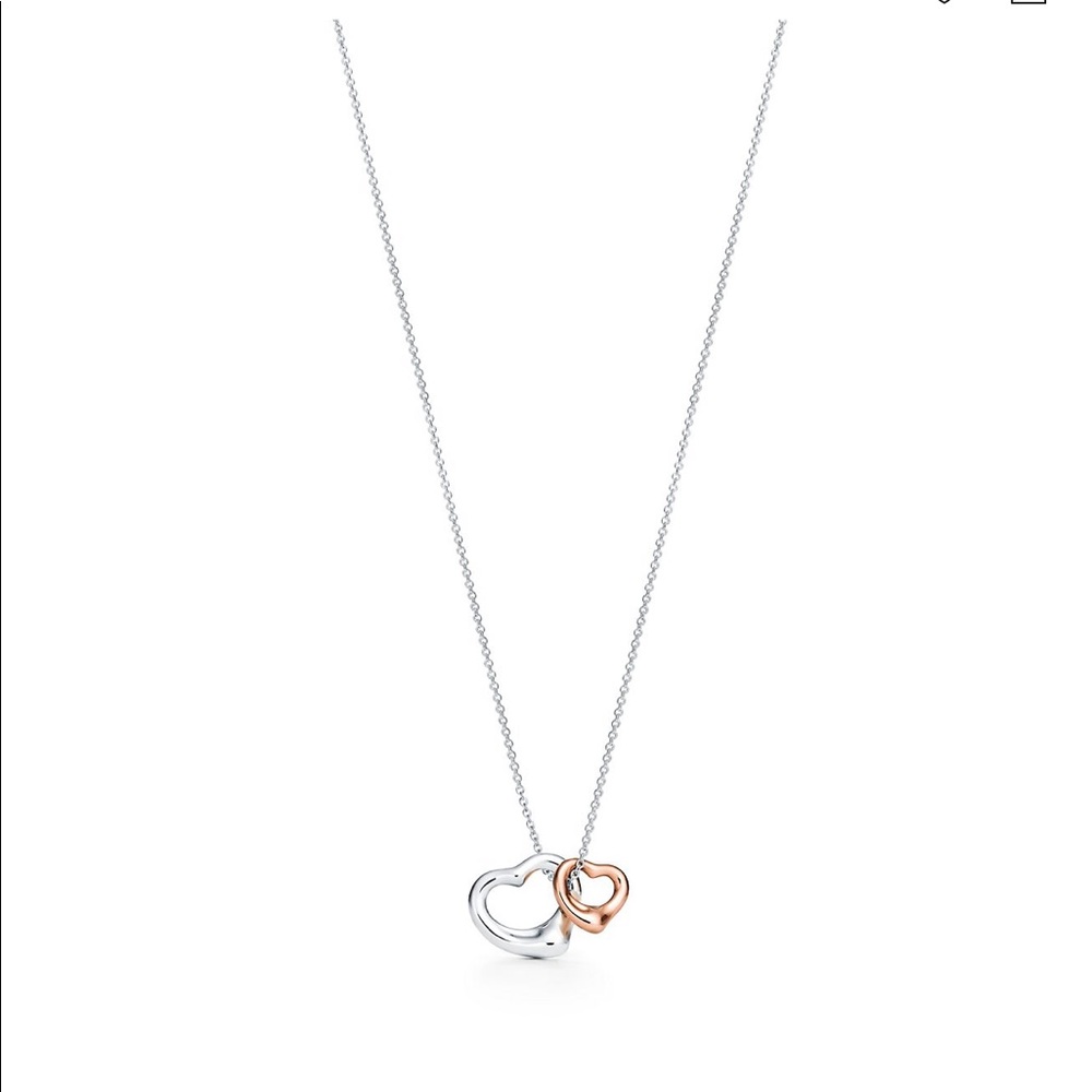 Never been used -Tiffany & Co open heart pendant